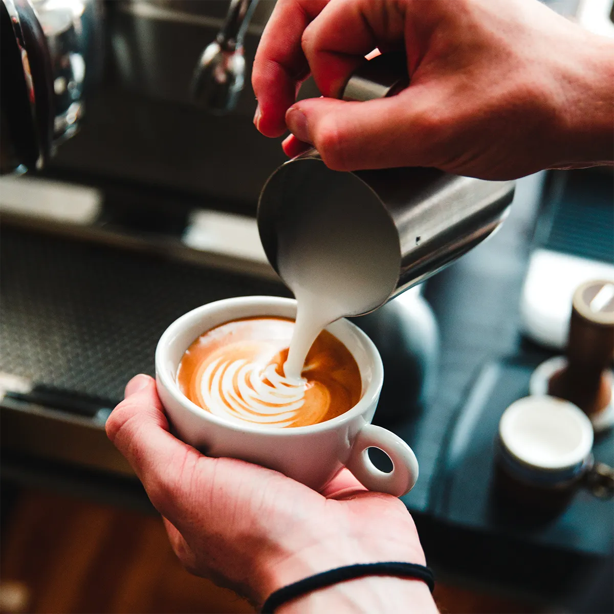Pouring coffee with latte art